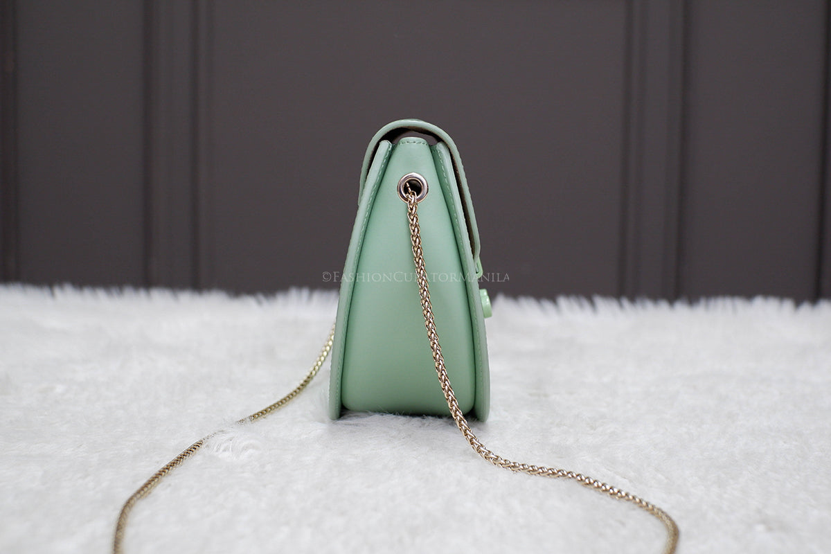 LIKE NEW FURLA METROPOLIS ROUND CROSSBODY GREEN