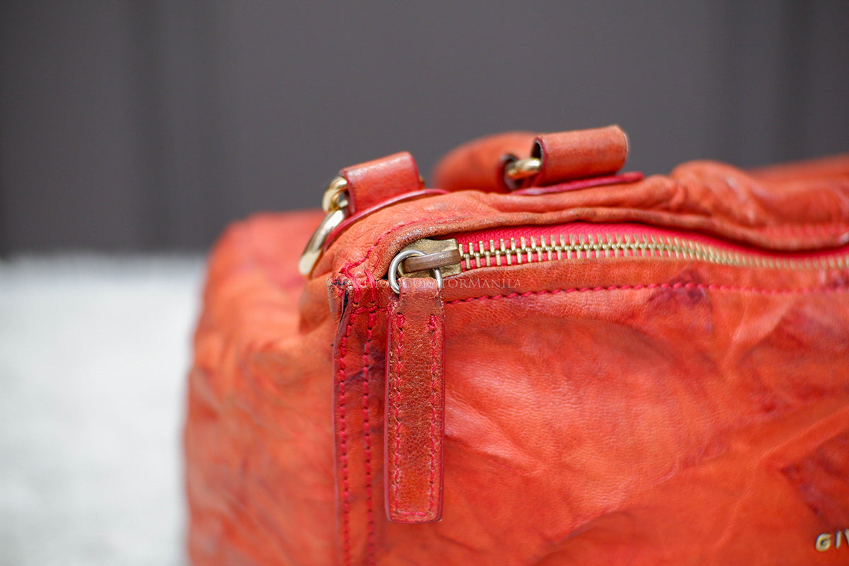 PRE-OWNED GIVENCHY MEDIUM PANDORA ORANGE TOP HANDLE SLING