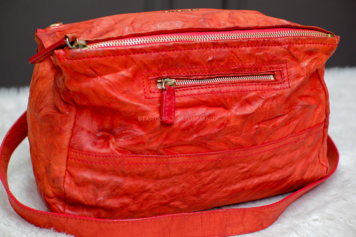 PRE-OWNED GIVENCHY MEDIUM PANDORA ORANGE TOP HANDLE SLING