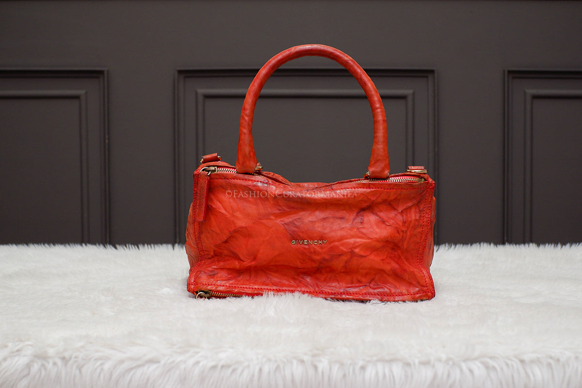 PRE-OWNED GIVENCHY MEDIUM PANDORA ORANGE TOP HANDLE SLING