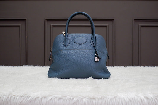PRE-OWNED HERMES BOLIDE 31 BLUE SAPPHIRE STAMP O SQUARE