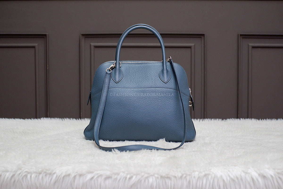 PRE-OWNED HERMES BOLIDE 31 BLUE SAPPHIRE STAMP O SQUARE