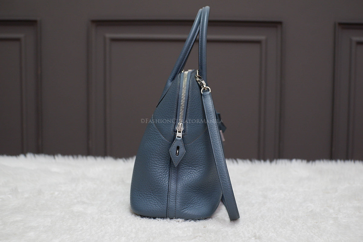 PRE-OWNED HERMES BOLIDE 31 BLUE SAPPHIRE STAMP O SQUARE