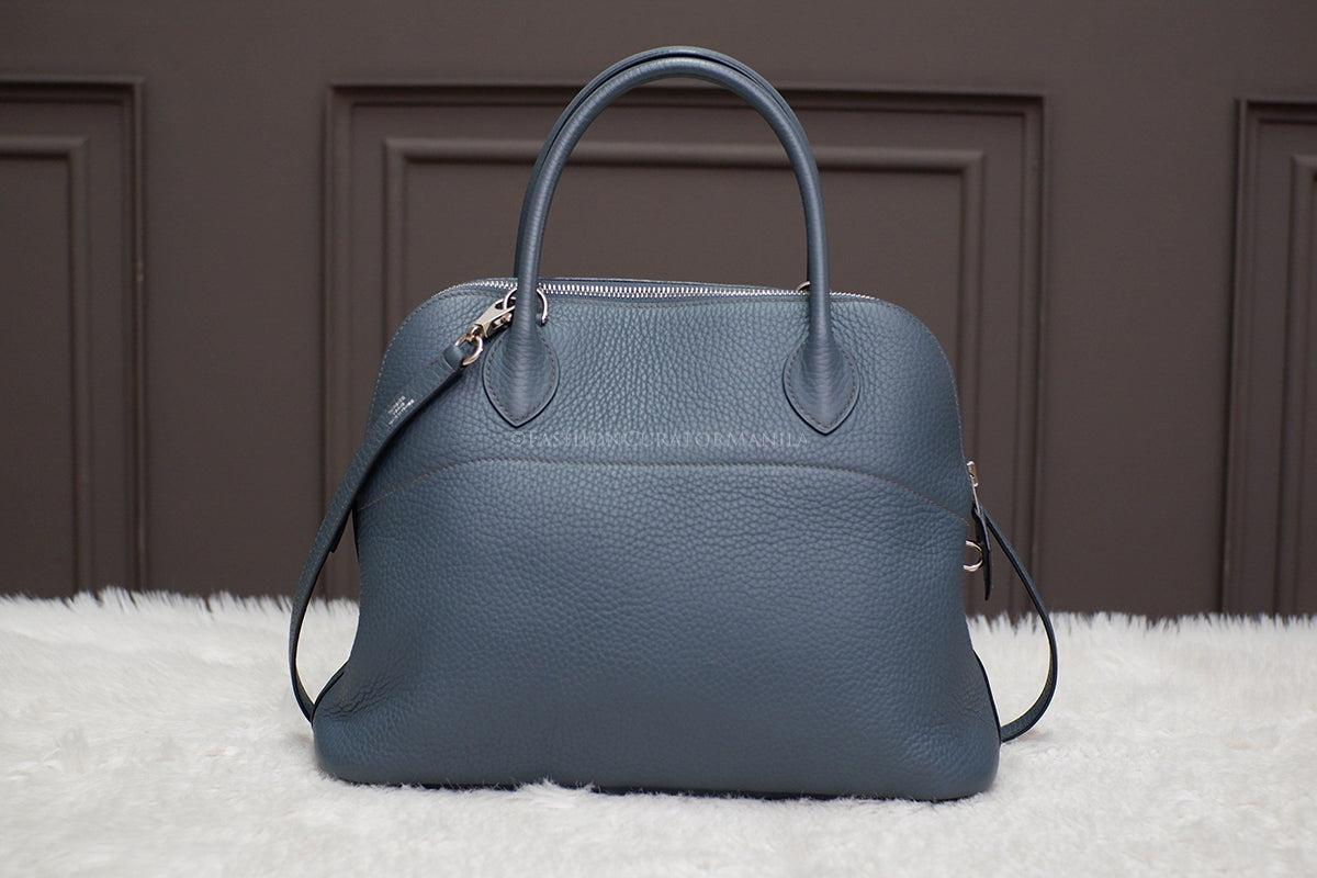 PRE-OWNED HERMES BOLIDE 31 BLUE SAPPHIRE STAMP O SQUARE