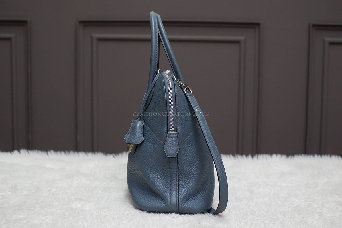 PRE-OWNED HERMES BOLIDE 31 BLUE SAPPHIRE STAMP O SQUARE